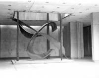 An abstract expressionist sculptor which looks like two slides crisscrossing